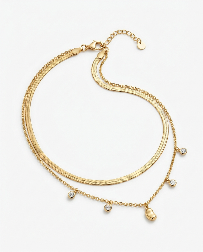 Vespera Belly Chain in gold — herringbone band with crystal chain